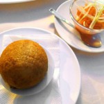 arancino di cous cous con pomodoro ghiacciato e sedano croccante